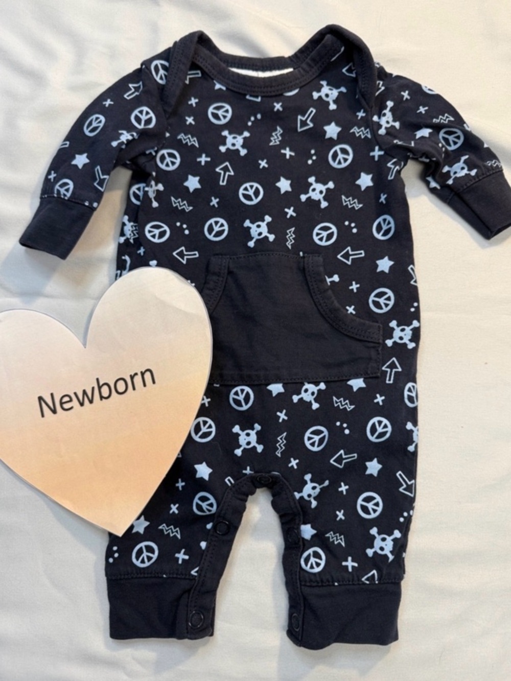Amy Coe Black Romper with White Peace & Skull Print